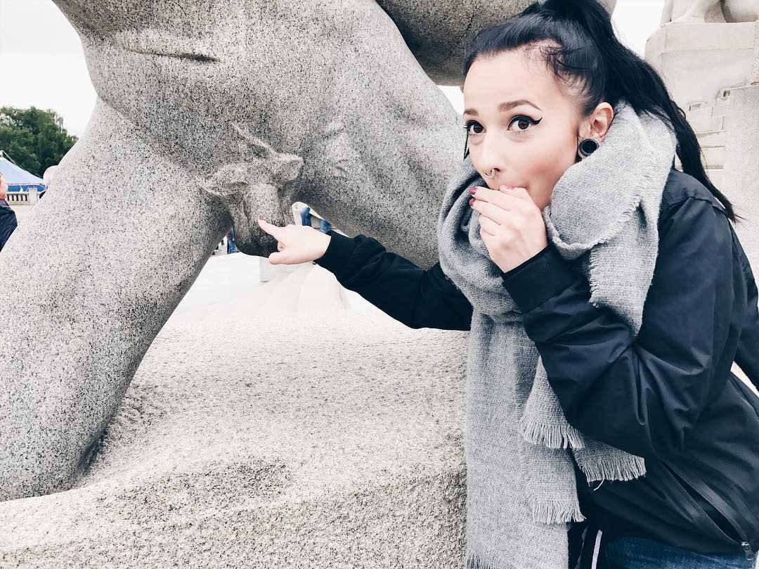 Woman reacting posing or Touching Small Penis Statue - EroMe